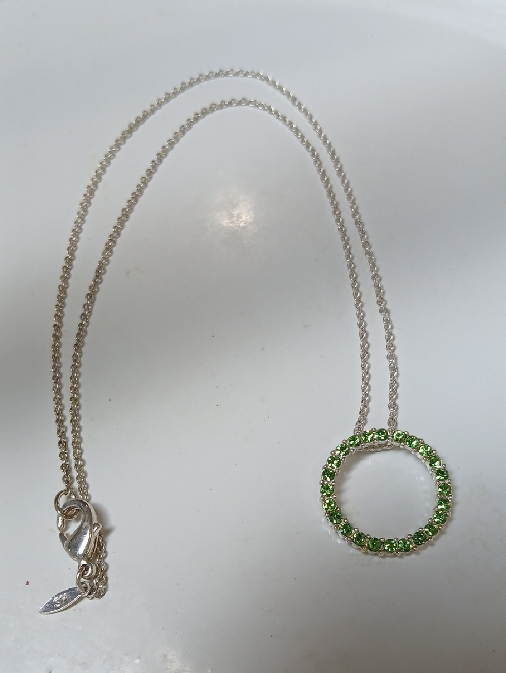Avon Silver-Tone Circle Necklace with Green Crystals